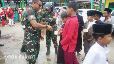 Kodim 0416/Bute Gelar Patroli Merah Putih dan Jumat Berkah Meski Diguyur Hujan