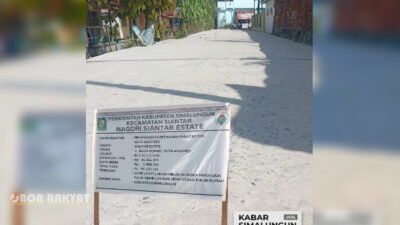 ​Simalungun, Obor Rakyat — Pelaksanaan pekerjaan fisik perkerasan rabat beton di Huta Anggrek, Jalan Naga Bonar, Nagori Siantar Estate, Kecamatan Siantar, Kabupaten Simalungun, Sumatera Utara, menuai sorotan masyarakat.